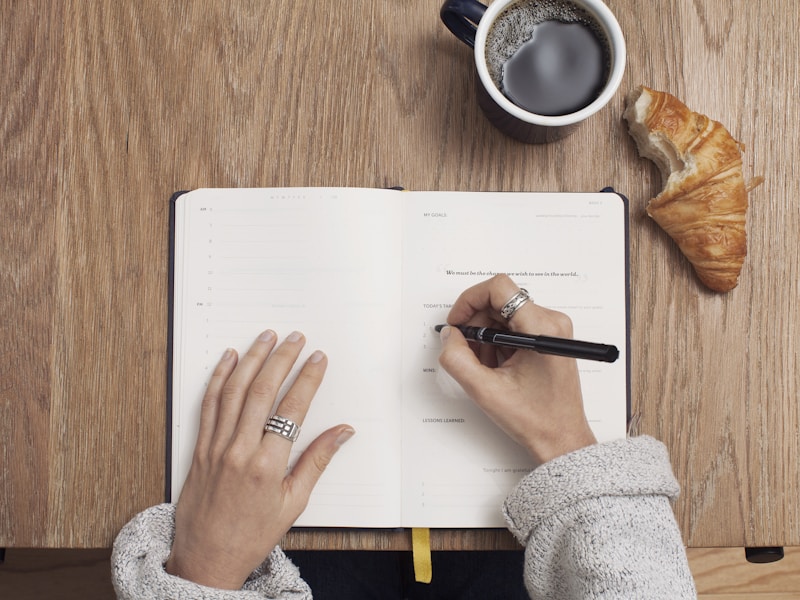 Open guidebook on a wooden desk